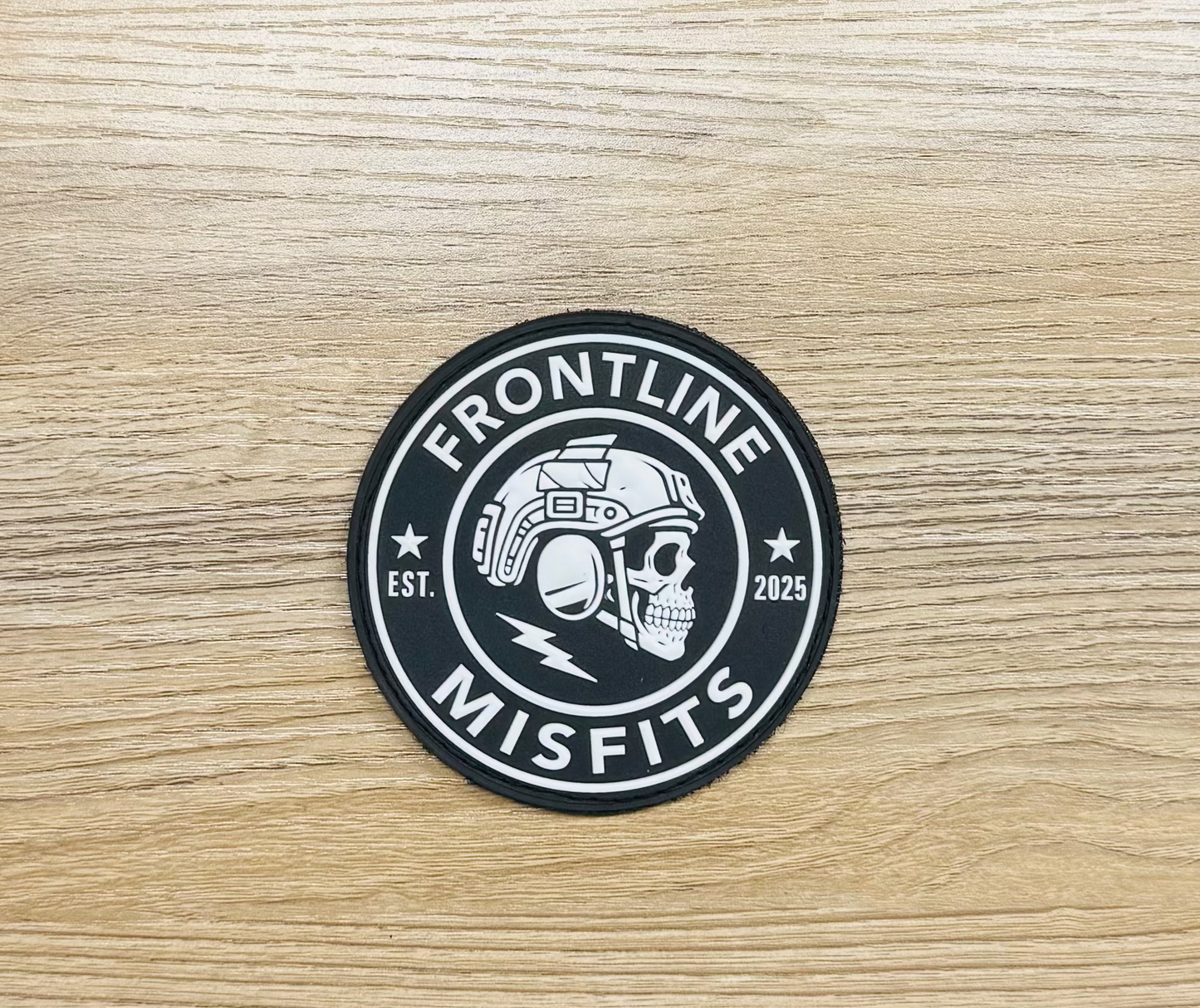 Frontline Misfits Logo PVC Patch – Hook-Backed Velcro Morale Patch