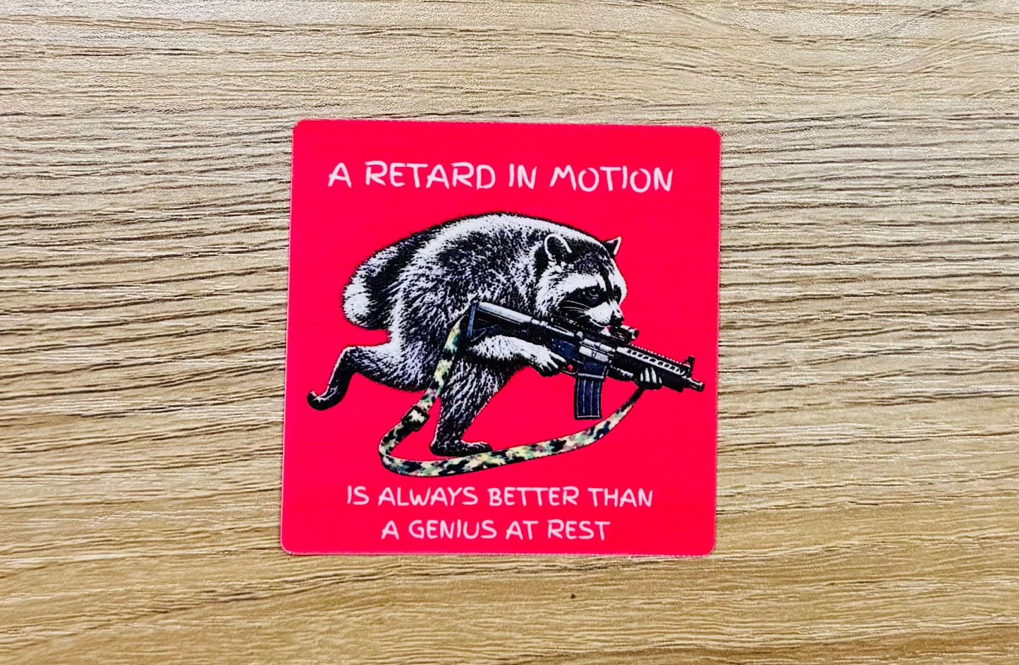 In Motion – Tactical Raccoon Morale Sticker | Frontline Misfits